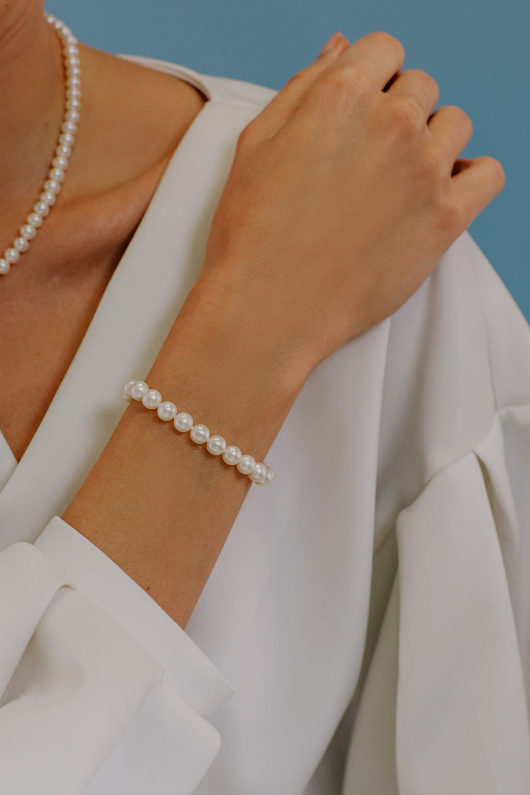 Comete Acquadolce Perlenstrang-Armband aus Silber und Gelbgold, Stern BRQ310