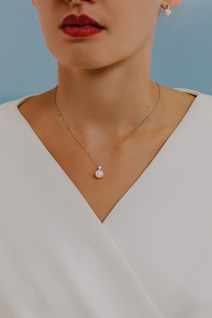 Comete Halskette Perlenlichtpunkt in Gold und Diamant GLP595