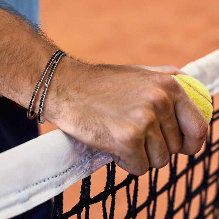 Comete Tennis i 925‰ sølv og UBR900 sorte og hvide zirkoner