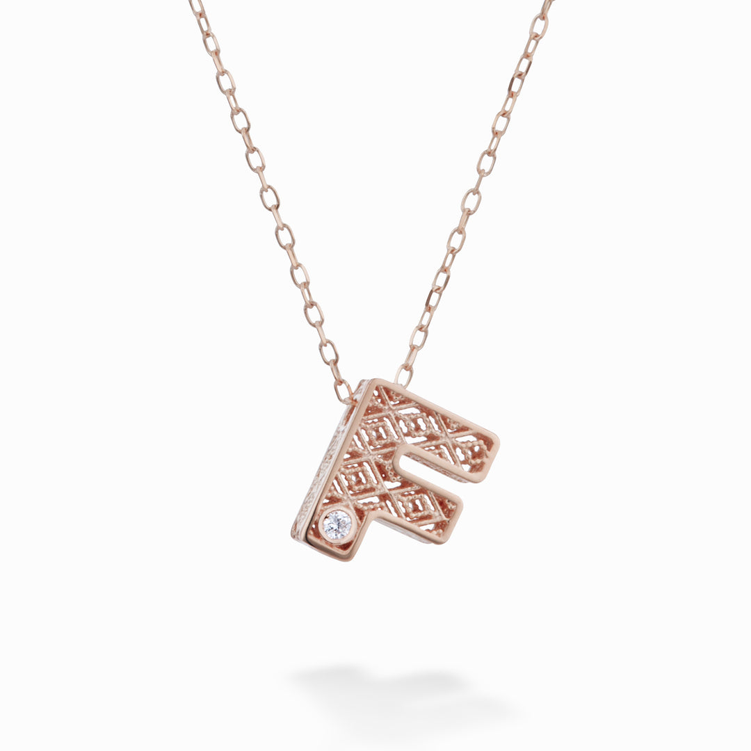 Nihama cl 18k bokstav f roséguld diam. ct.0,01 NDLETFO3