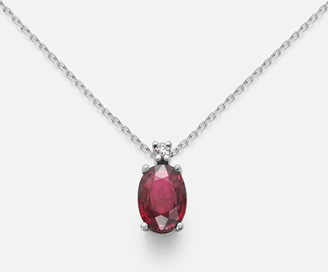 Nihama cl 9k ruby ​​n. oval 7x5 ct.0,80 diam. ct.0,015 ND5035R4RBN080