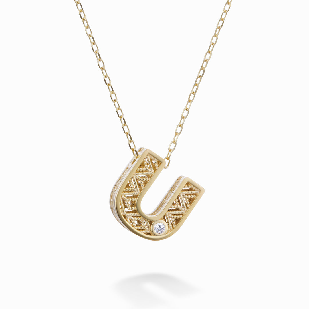 Nihama cl 18k bokstav u gult guld diam. ct.0,01 NDLETUO1