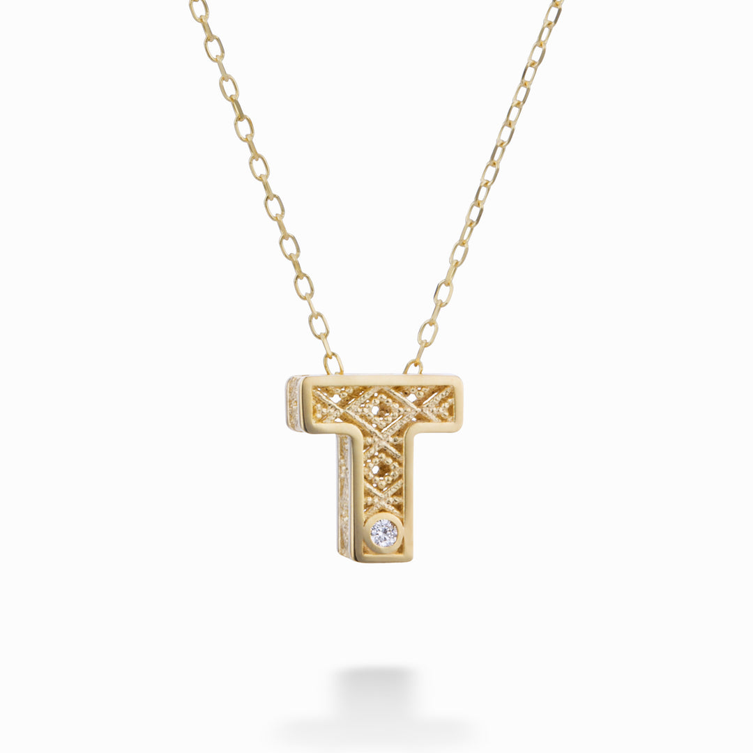 Mikiko cl 18k Buchstabe T Gelbgold Durchm. ct.0,01 MDLETTO1
