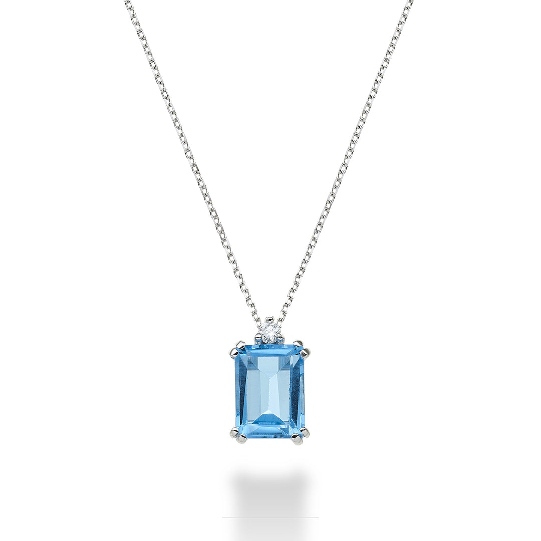 Mikiko cl 18k oktagonal blå topas 8x6 ct.2,10 diam. ct.0,03 MPCL090DITPAZ3O4