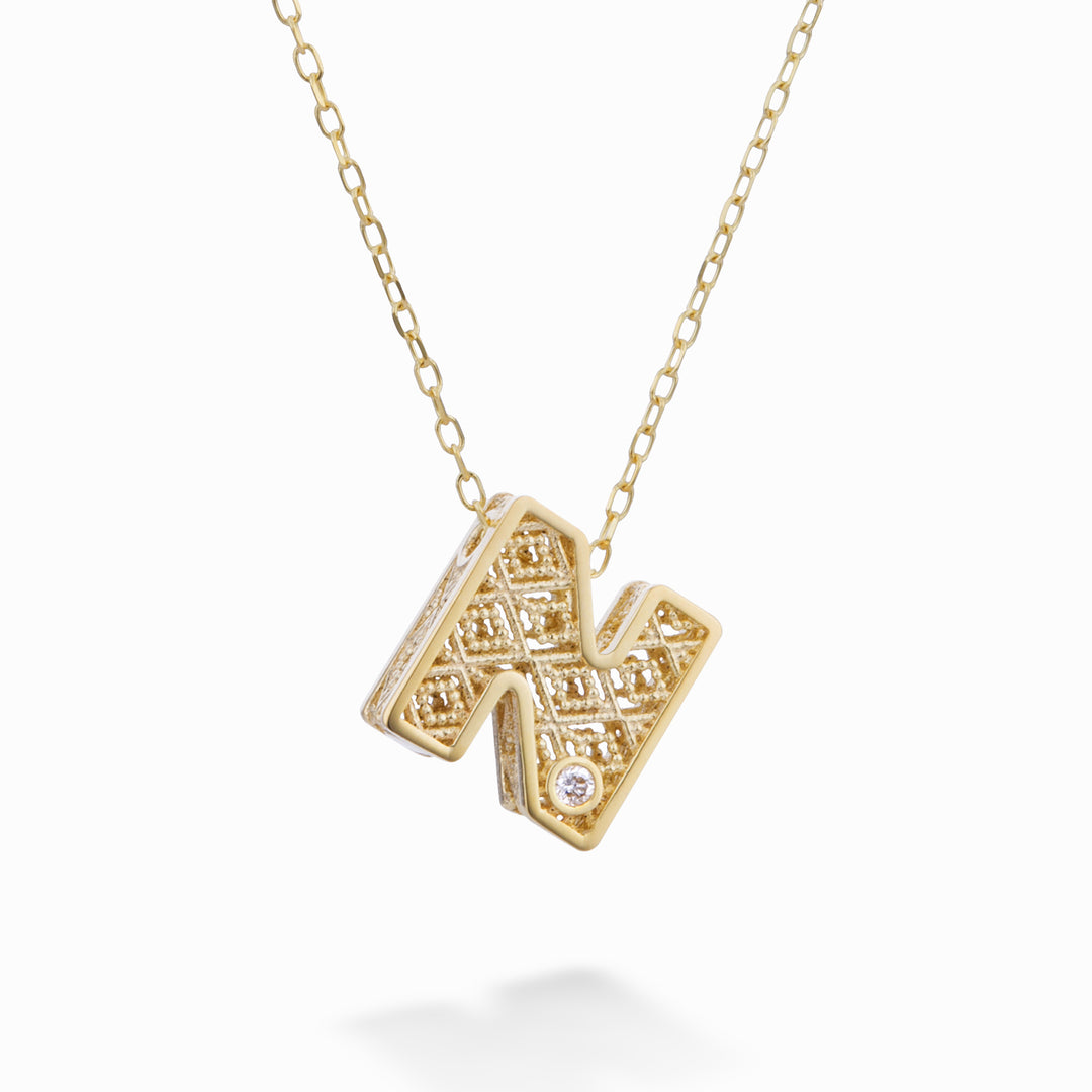 Nihama cl 18k bokstav n gult guld diam. ct.0,01 NDLETNO1