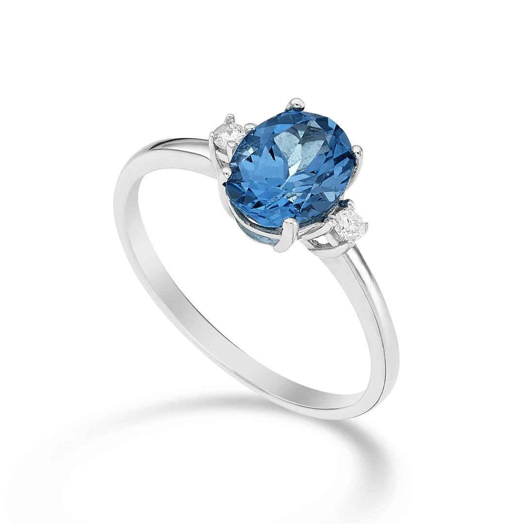 Mikiko an 18k oval London blue topaz 8x6 ct.1,40 diam. 0.05 ct MA5074O4TPBL
