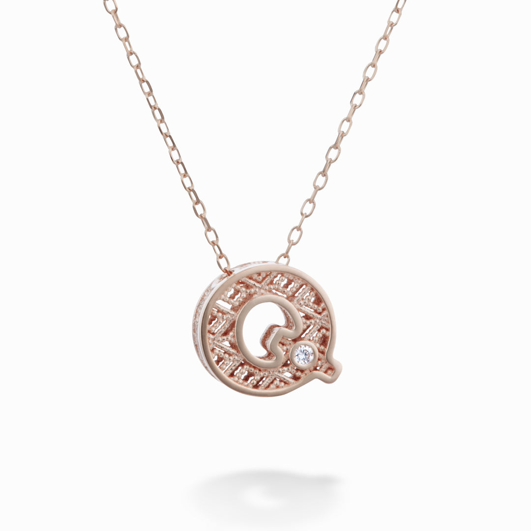 Nihama cl 18k bokstaven q roséguld diam. ct.0,01 NDLETQO3
