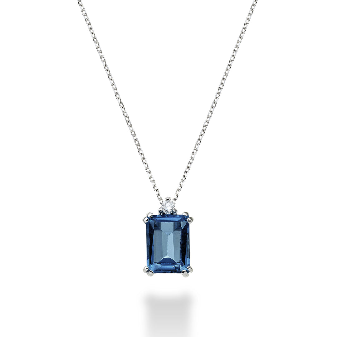Mikiko cl 18k achteckiger Londoner Blautopas 8x6 ct.2,65 Durchm. ct.0,03 MPCL090DITPBL3O4