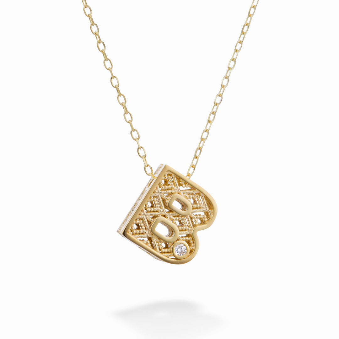 Mikiko cl 18k bokstav b gult guld diam. ct.0,01 MDLETBO1