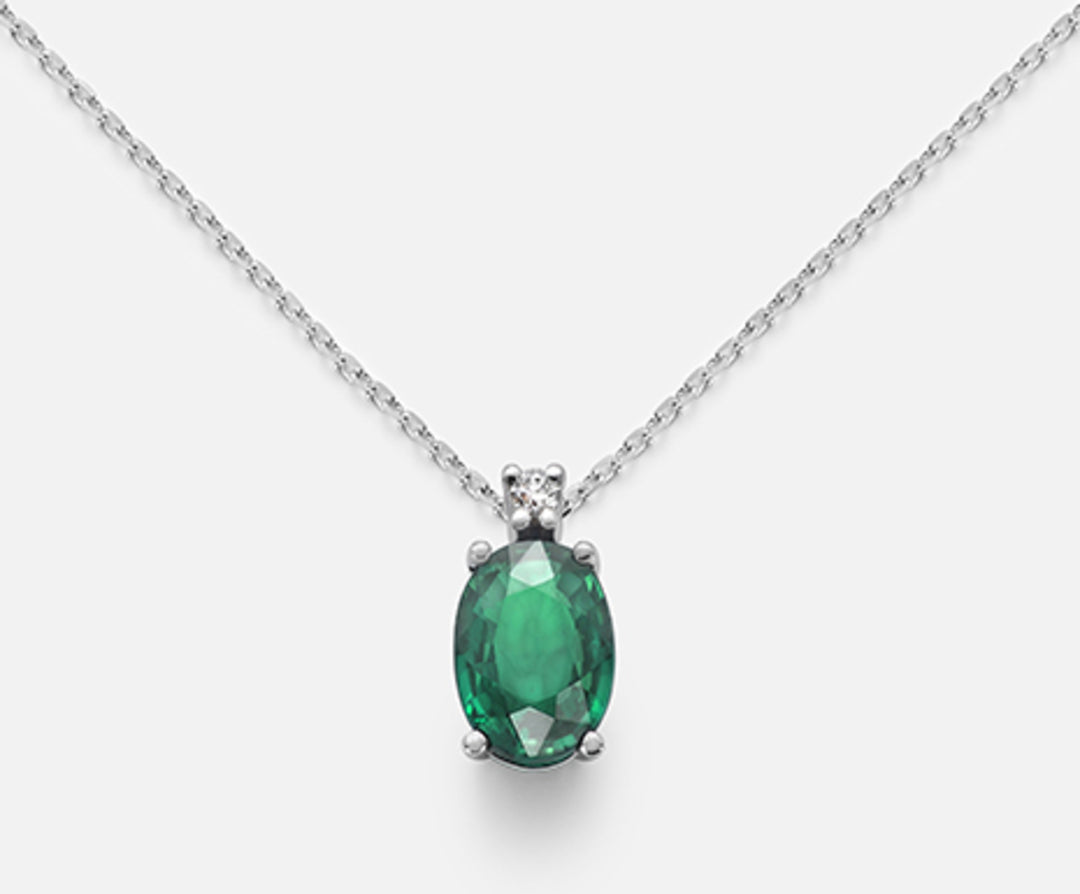 Mikiko cl 9k oval emerald 7x5 ct.0.60 diam. ct.0,015 MD5035R4BE