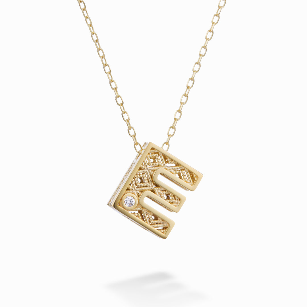 Mikiko cl 18k letter and yellow gold diam. ct.0,01 MDLETEO1